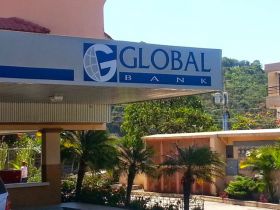 Global Bank in Panama, view of sign and background of building – Best Places In The World To Retire – International Living